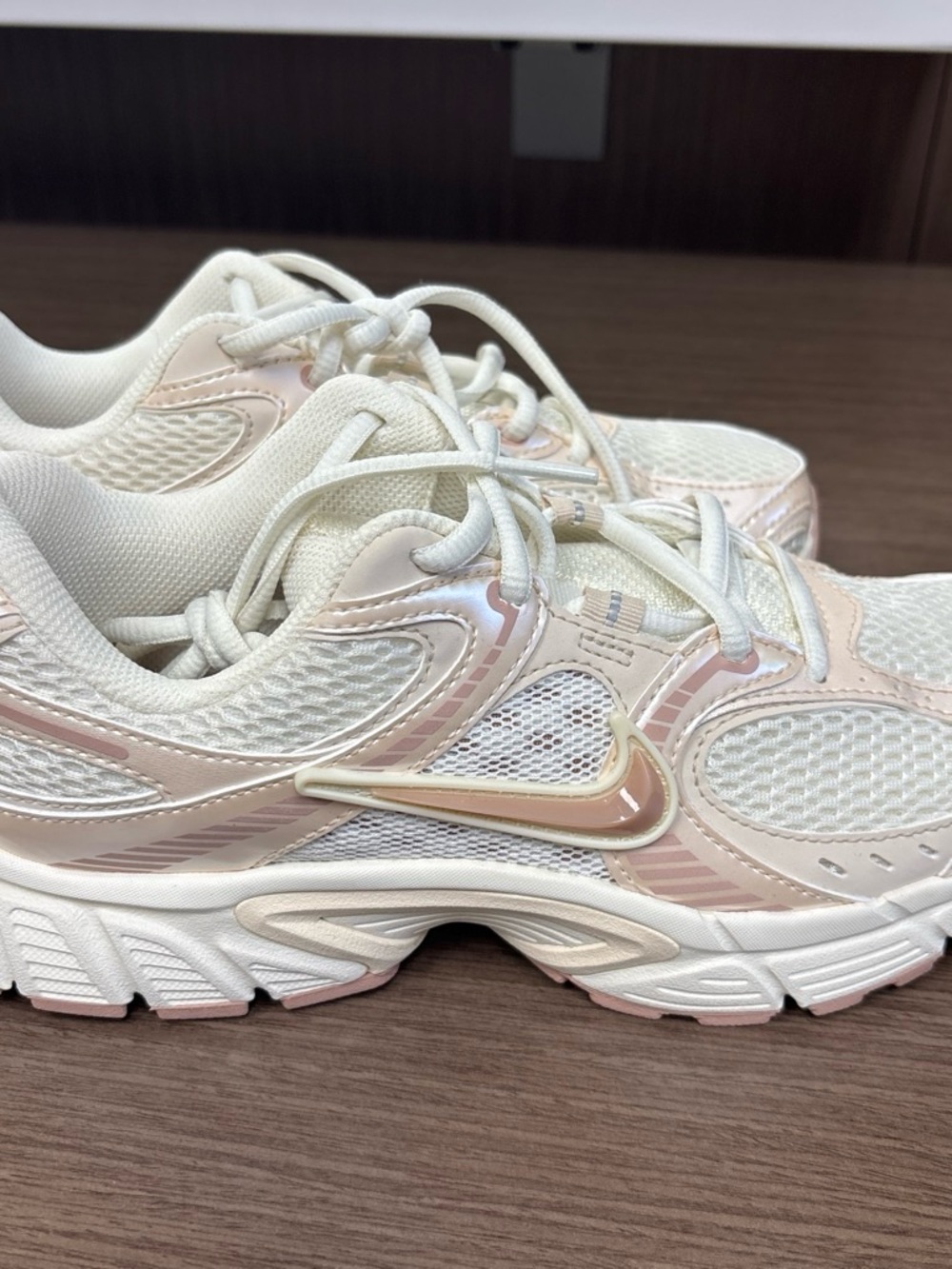 Nike Women’s Cream and Pale Pink Mesh Athletic Shoes